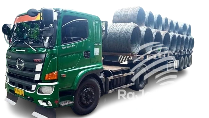 Trailer flatbed RaJa Trans membawa wire rod baja
